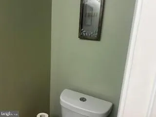 a bathroom with a toilet and sink