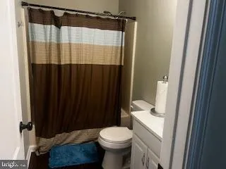 a bathroom with a sink and toilet