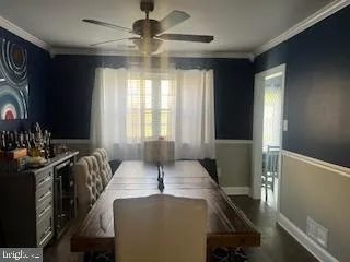 a view of a livingroom with furniture and windows