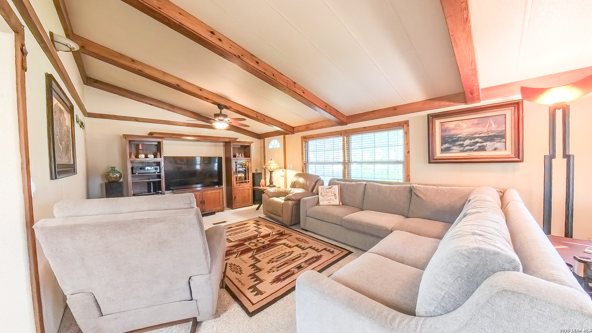 857 Madrona Road Pipe Creek, TX 78063 - Photo 11 of 49 a living room with furniture and a large window
