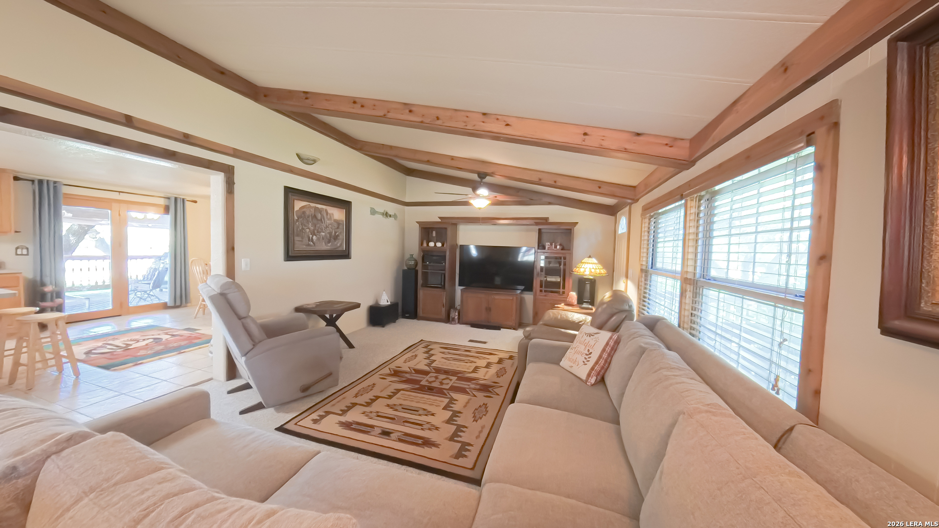 857 Madrona Road Pipe Creek, TX 78063 - Photo 12 of 49 a living room with furniture and a table