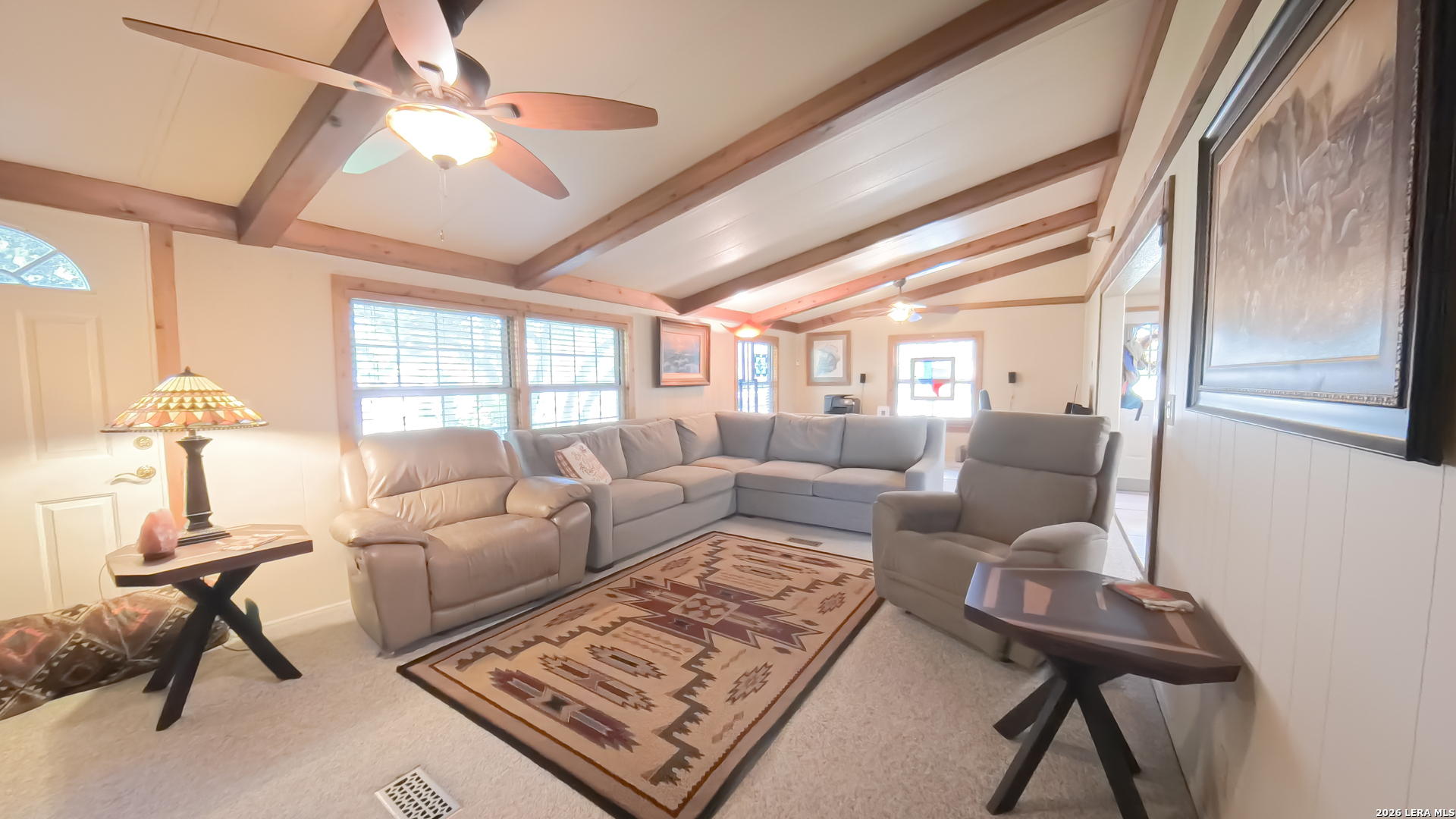 857 Madrona Road Pipe Creek, TX 78063 - Photo 13 of 49 a living room with furniture and a window