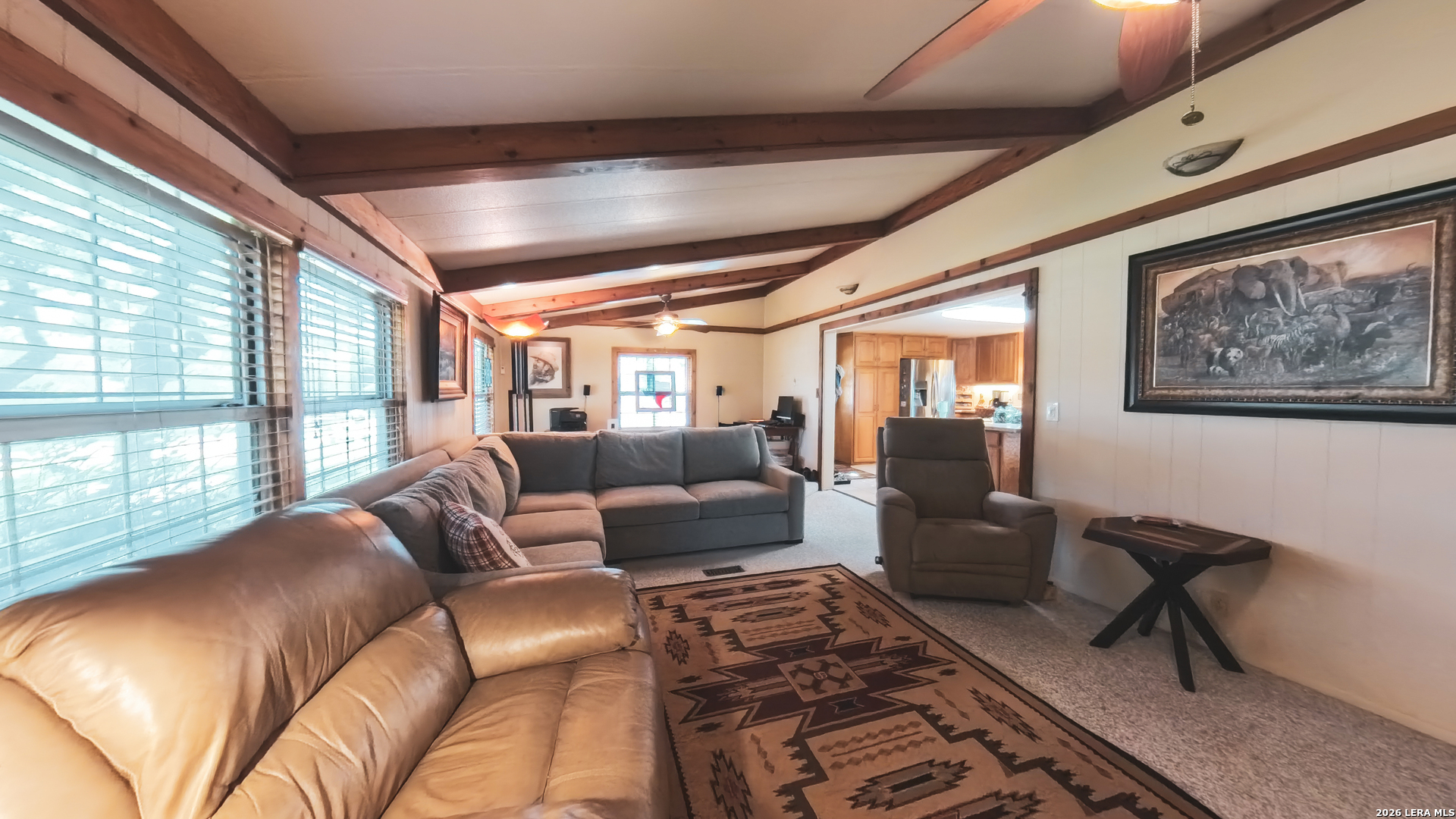 857 Madrona Road Pipe Creek, TX 78063 - Photo 14 of 49 a living room with furniture and a large window