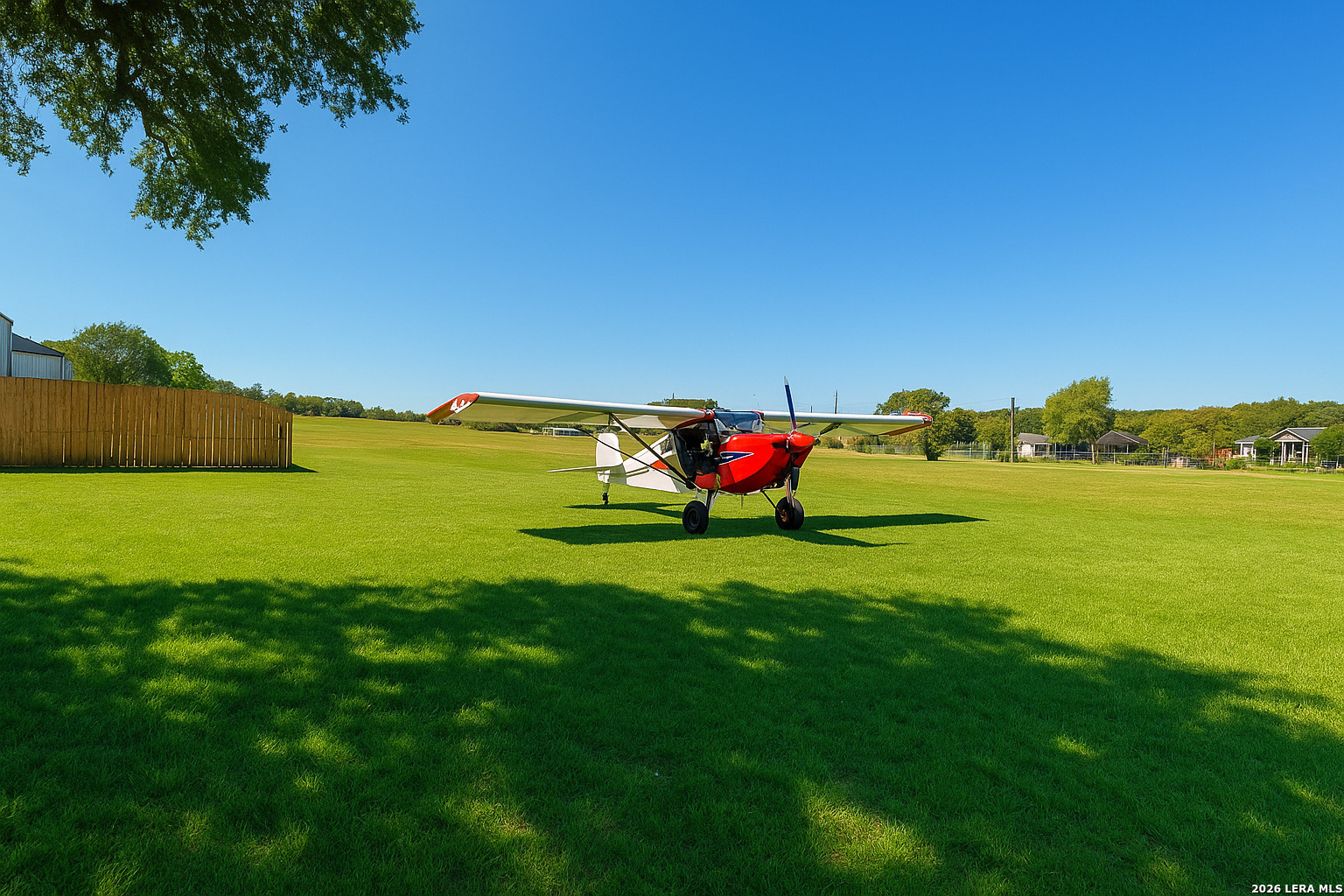 857 Madrona Road Pipe Creek, TX 78063 - Photo 2 of 49 a view of a green field with clear sky