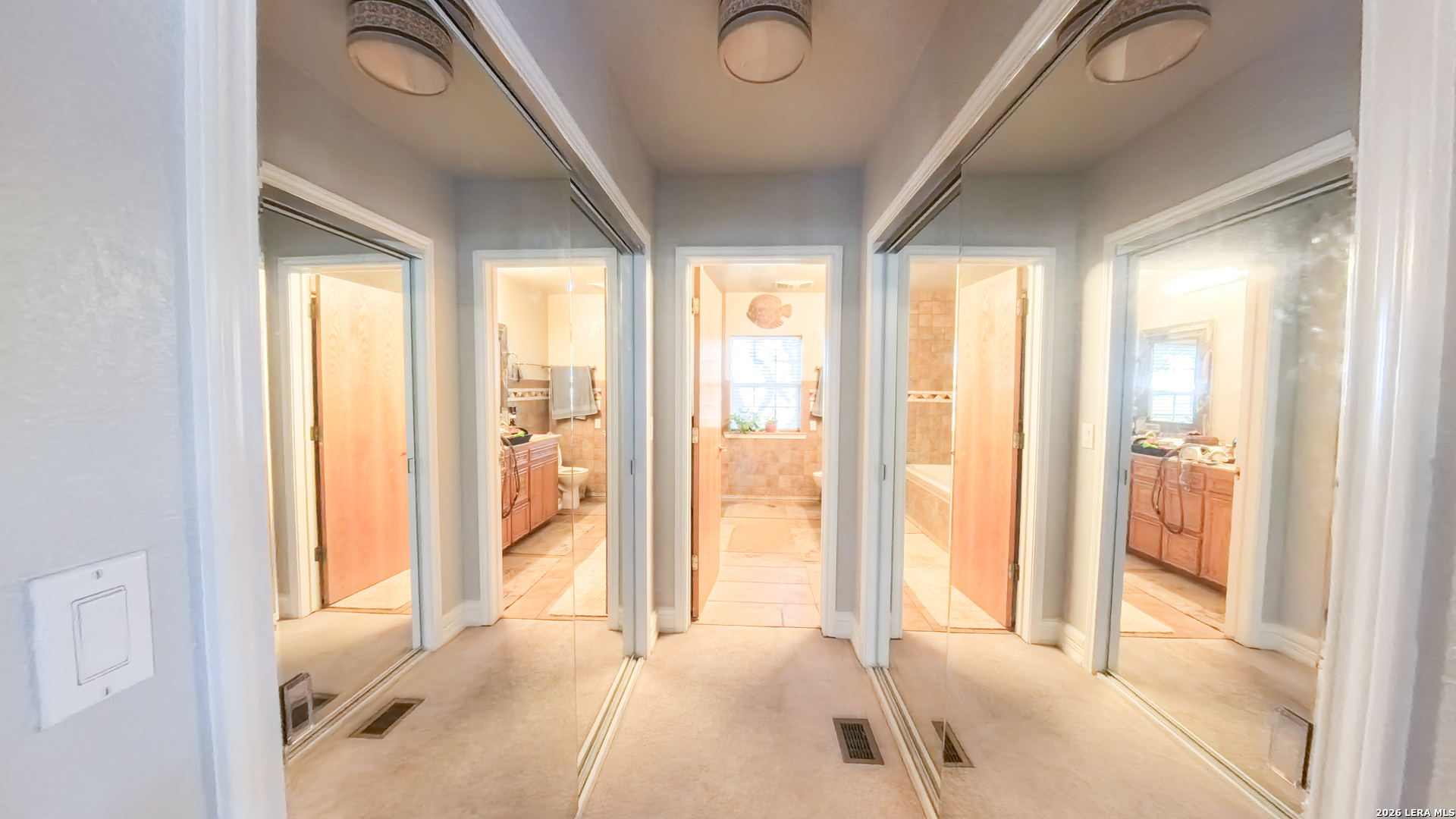 857 Madrona Road Pipe Creek, TX 78063 - Photo 26 of 49 a view of a bedroom with windows