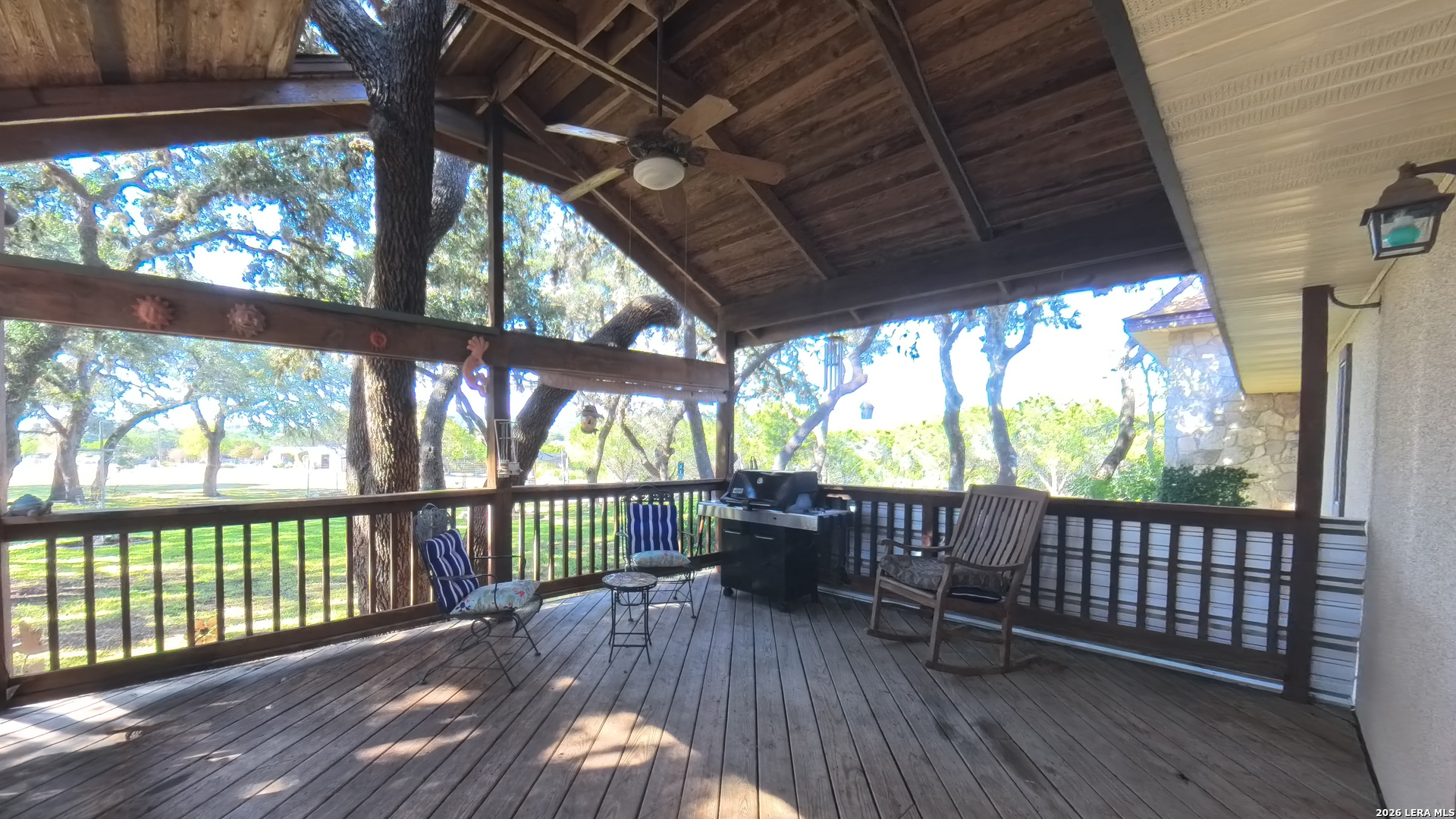 857 Madrona Road Pipe Creek, TX 78063 - Photo 5 of 49 a view of porch with wooden floor