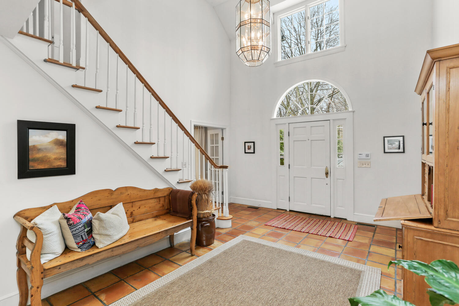 215 Marvin Ridge Road New Canaan, CT 06840 - Photo 16 of 31 a living room with furniture and a rug
