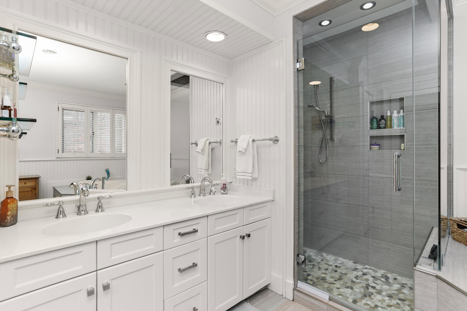 215 Marvin Ridge Road New Canaan, CT 06840 - Photo 19 of 31 a bathroom with a shower sink double and mirror