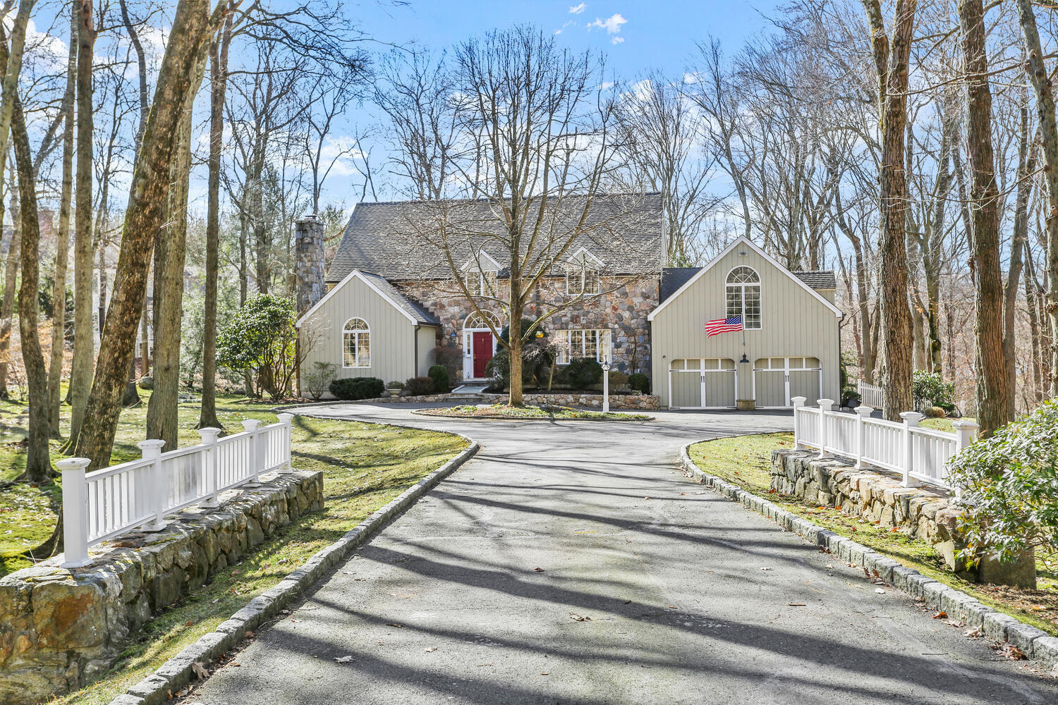 215 Marvin Ridge Road New Canaan, CT 06840 - Photo 2 of 31 a view of swimming pool with sitting area and covered with trees