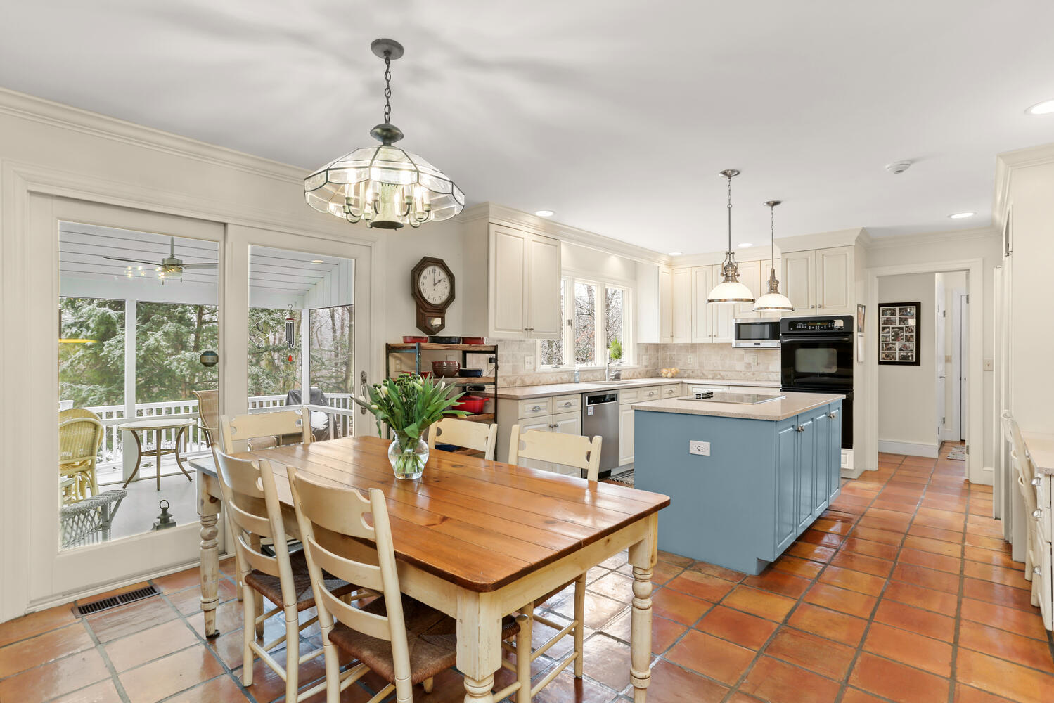 215 Marvin Ridge Road New Canaan, CT 06840 - Photo 10 of 31 a kitchen with stainless steel appliances kitchen island granite countertop a dining table chairs and granite counter tops