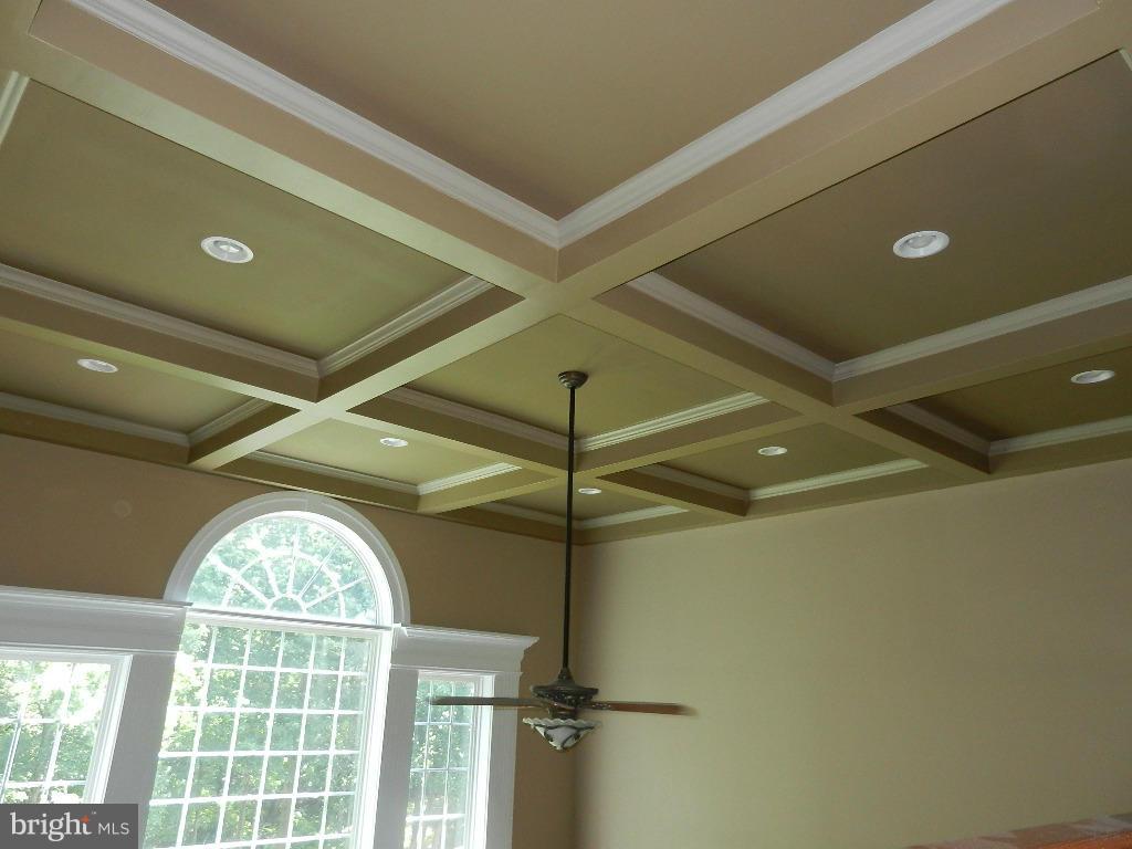 22526 Evergreen Mills Road Ashburn, VA 20148 - Photo 12 of 30 a view of a livingroom with a window and a chandelier