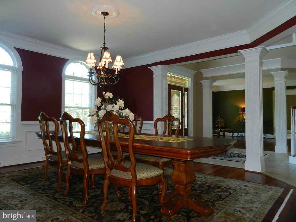 22526 Evergreen Mills Road Ashburn, VA 20148 - Photo 13 of 30 a dining room with furniture and window