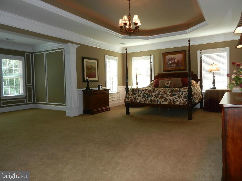 22526 Evergreen Mills Road Ashburn, VA 20148 - Photo 17 of 30 a bedroom with bed and window
