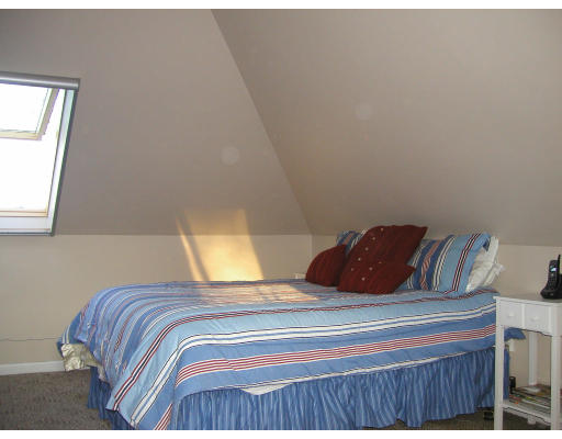 5 Station Road Salem, MA 01970 - Photo 11 of 17 a bedroom with a bed and window