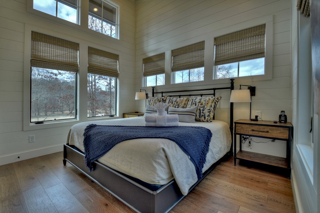 Hc9 Old Toccoa Loop Mineral Bluff, GA 30559 - Photo 24 of 41 a bed sitting in a bedroom next to a window