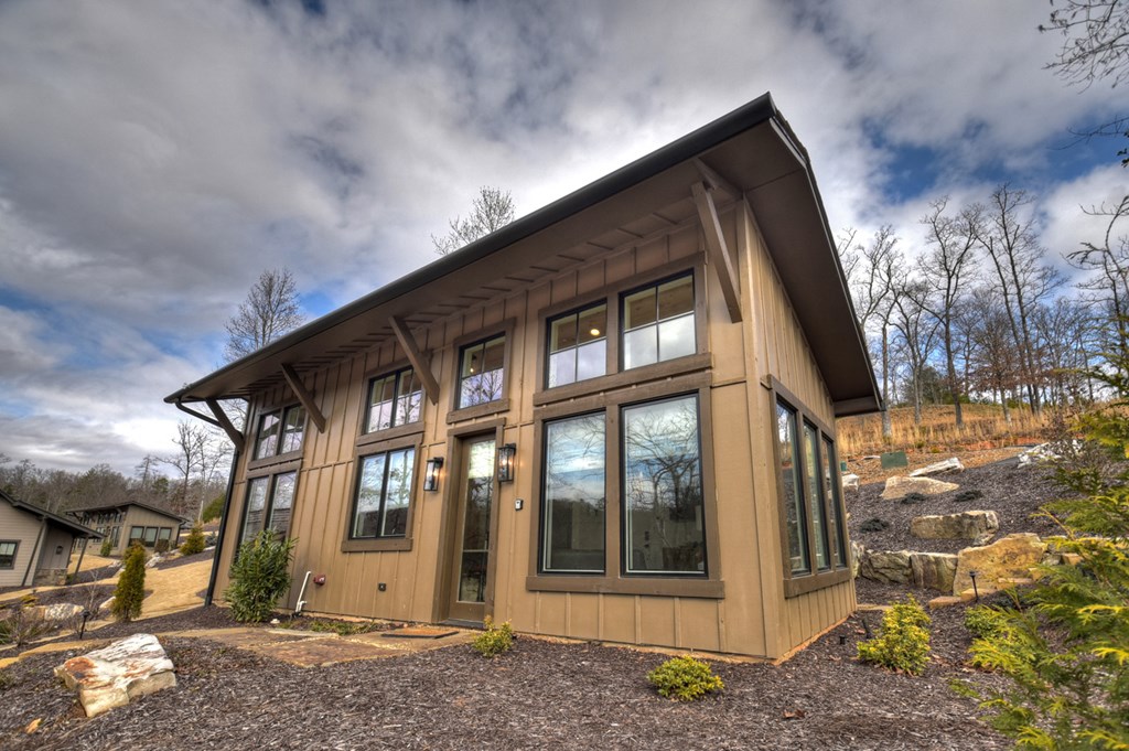 Hc9 Old Toccoa Loop Mineral Bluff, GA 30559 - Photo 5 of 41 a front view of a house with a garden