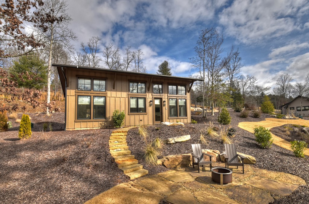 Hc9 Old Toccoa Loop Mineral Bluff, GA 30559 - Photo 6 of 41 a view of a house with backyard porch and sitting area