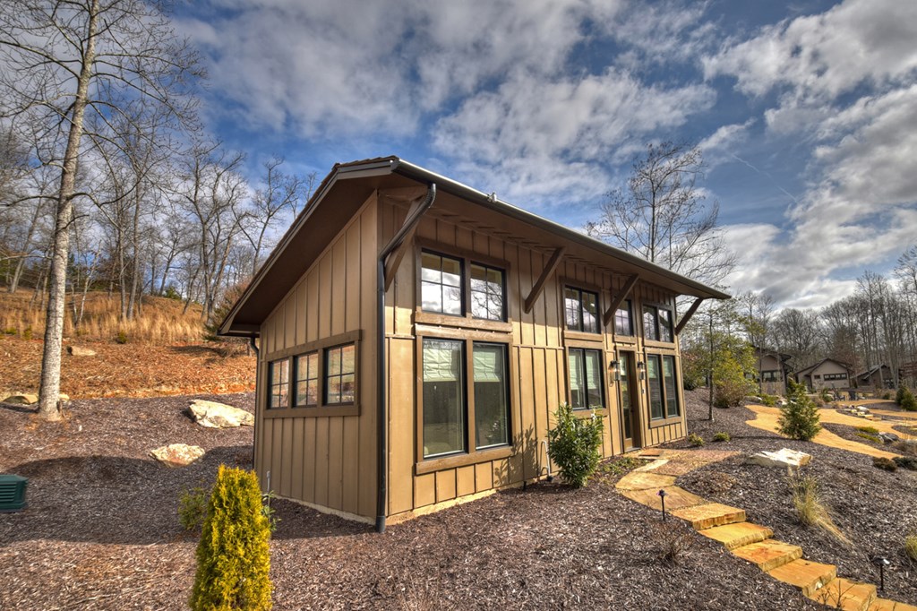 Hc9 Old Toccoa Loop Mineral Bluff, GA 30559 - Photo 9 of 41 a front view of a house with a yard