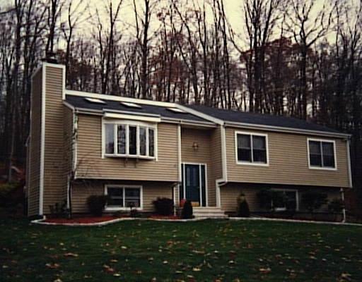 264 Turkey Roost Road Monroe, CT 06468 - Photo 1 of 1 a front view of a house with a yard