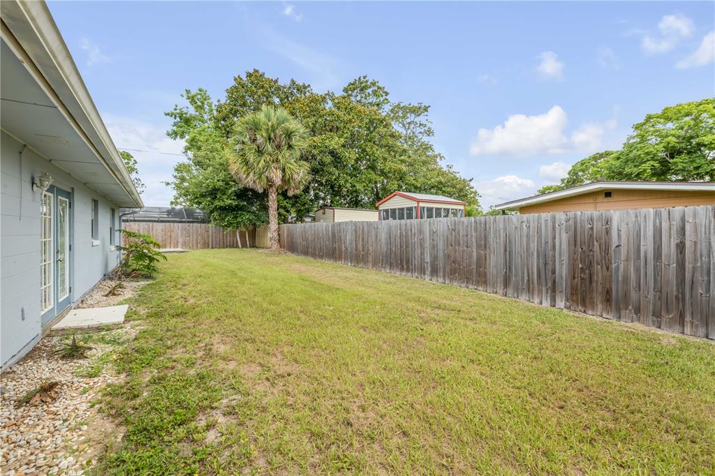 3132 Pine Tree Drive Edgewater, FL 32141 - Photo 29 of 32 a view of a backyard