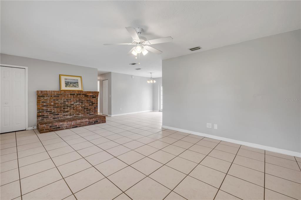 3132 Pine Tree Drive Edgewater, FL 32141 - Photo 7 of 32 a view of an empty room and window