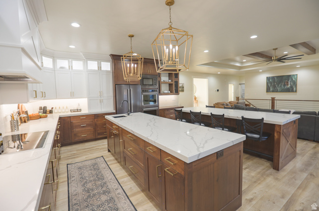 126 North 800 West Mapleton, UT 84664 - Photo 79 of 79 Kitchen with glass fronted cabinets, open floor plan, stainless steel appliances, light wood-style floors, and beam ceiling