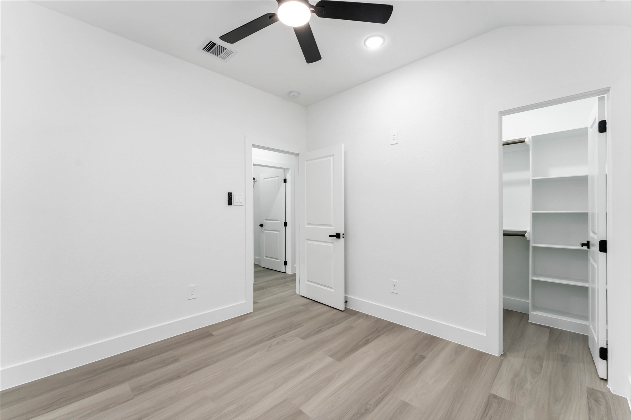 9406 Sandra Street, Unit A Houston, TX 77016 - Photo 20 of 28 a view of an empty room and wooden floor