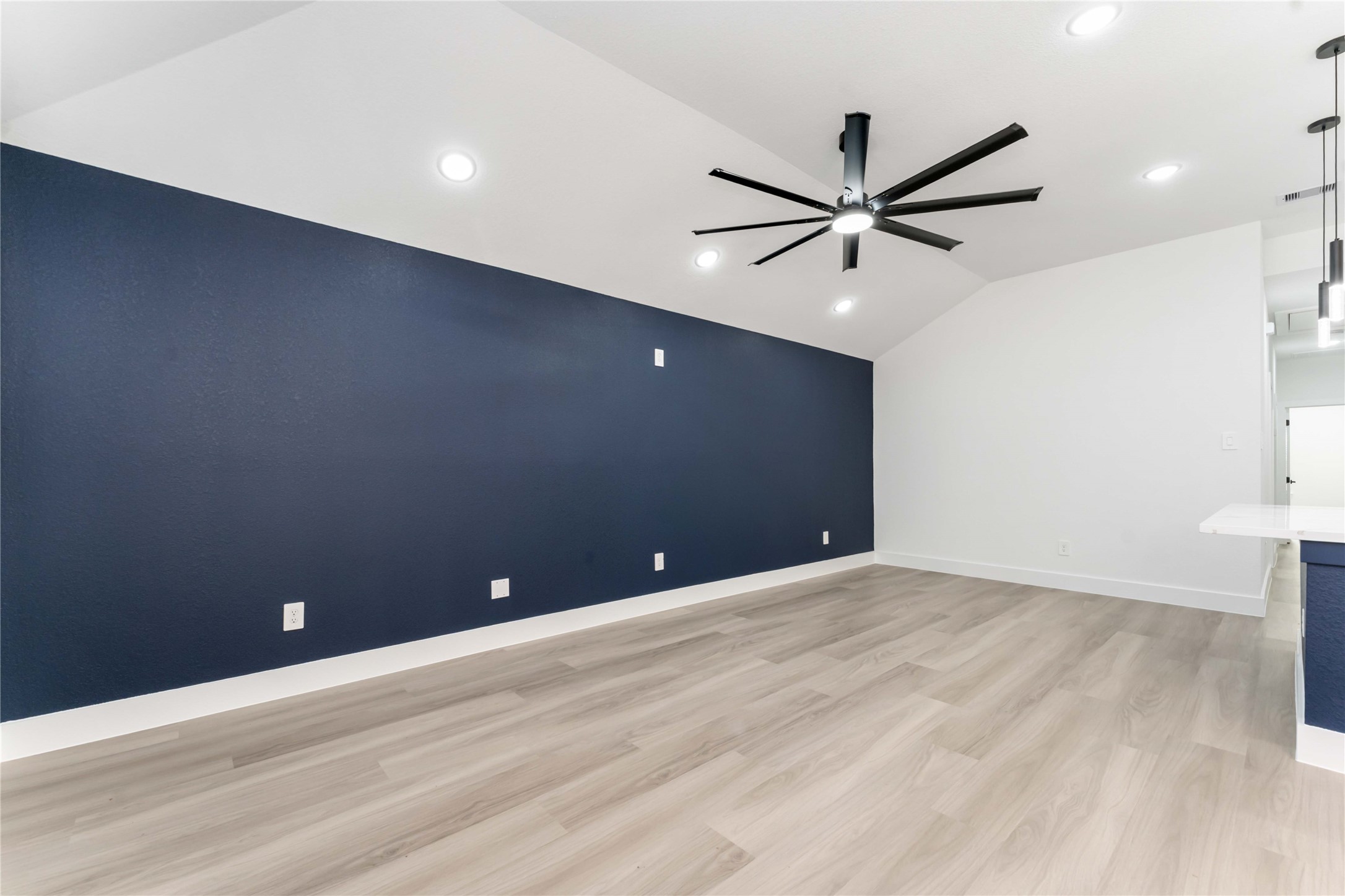 9406 Sandra Street, Unit A Houston, TX 77016 - Photo 3 of 28 a view of an empty room with a ceiling fan