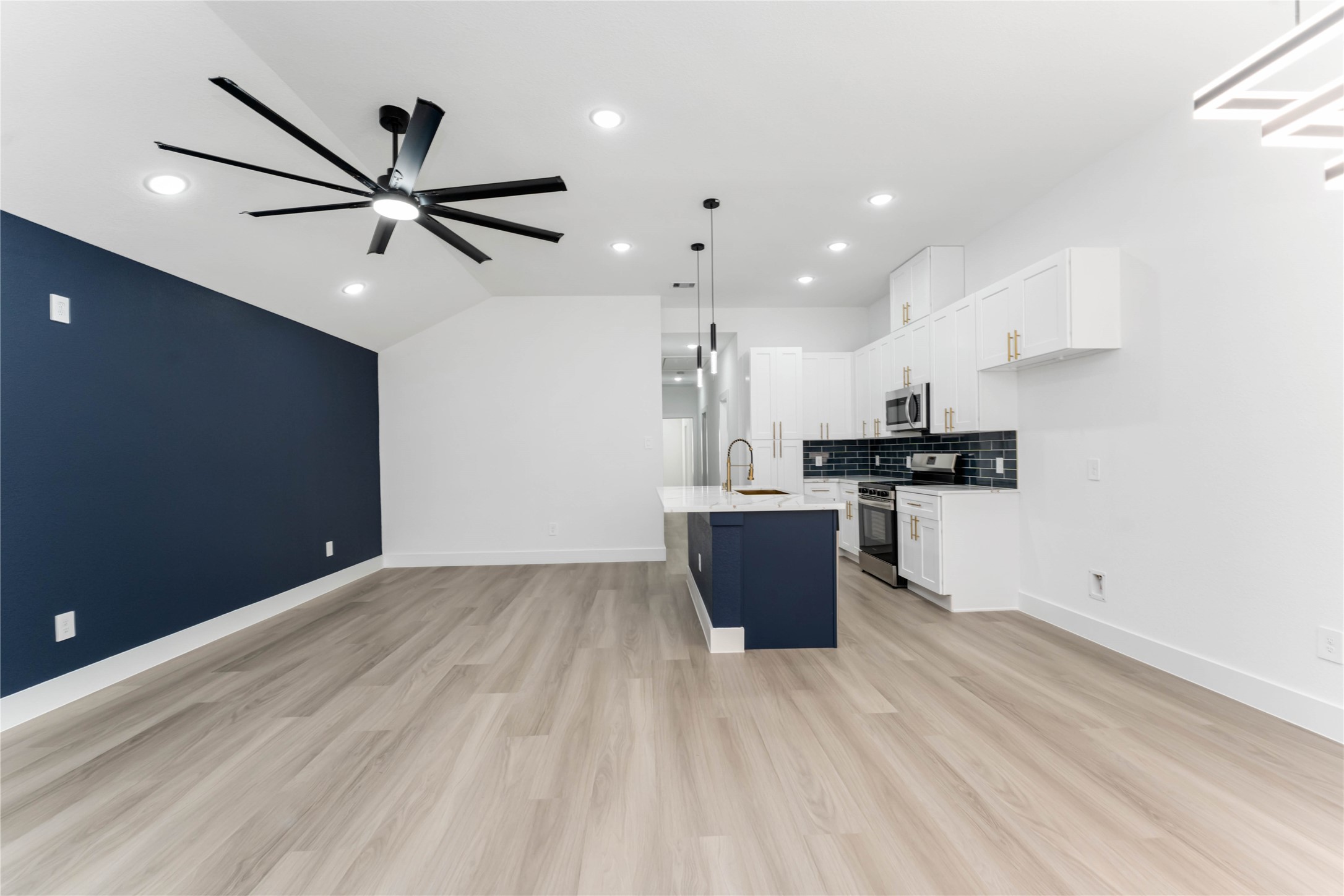 9406 Sandra Street, Unit A Houston, TX 77016 - Photo 6 of 28 a view of kitchen with stainless steel appliances a refrigerator counter top space and appliances
