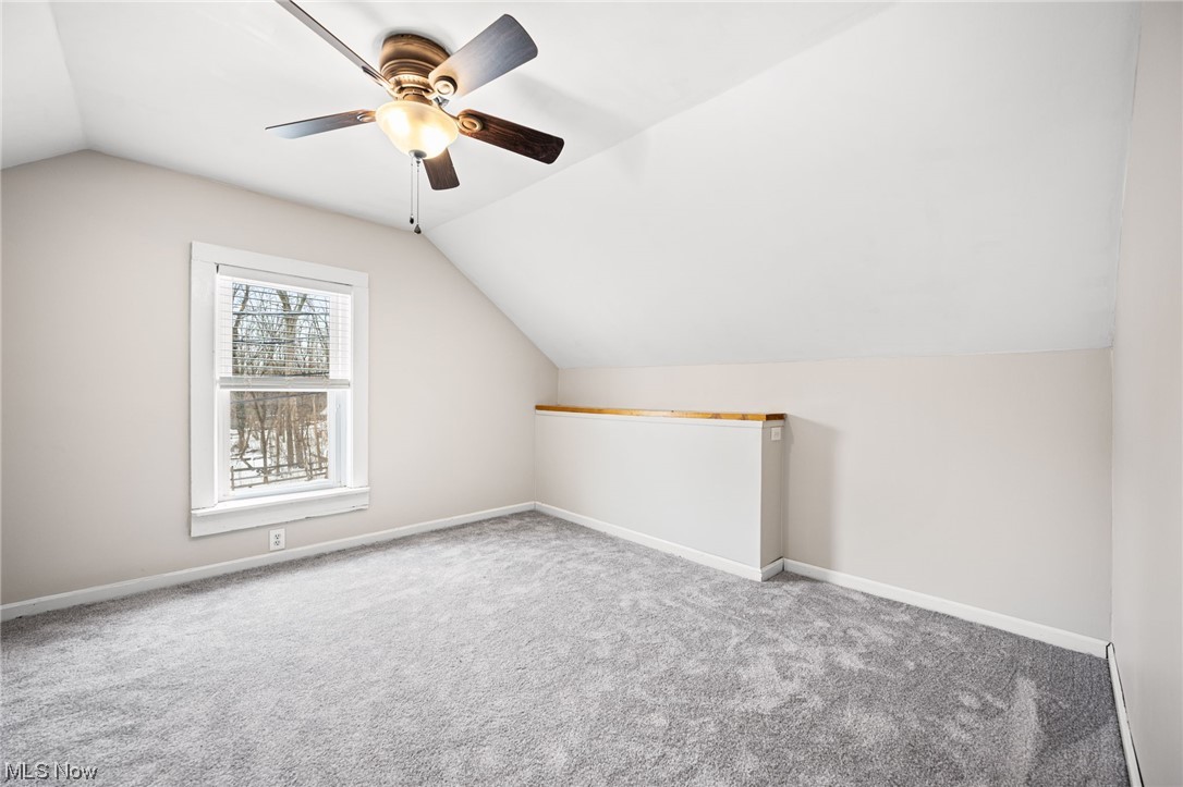 2986 Worrell Road Willoughby, OH 44094 - Photo 28 of 36 Bedroom 2 space featuring vaulted ceiling, light colored carpet, and ceiling fan