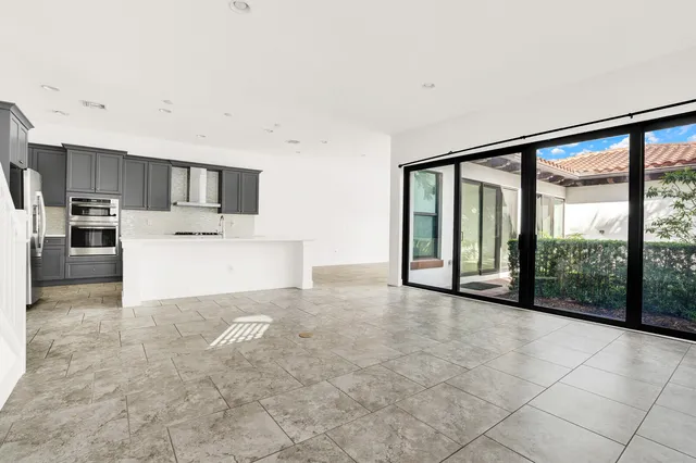 a view of a kitchen with a sink and a microwave