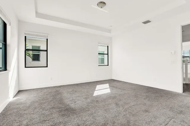 an empty room with windows