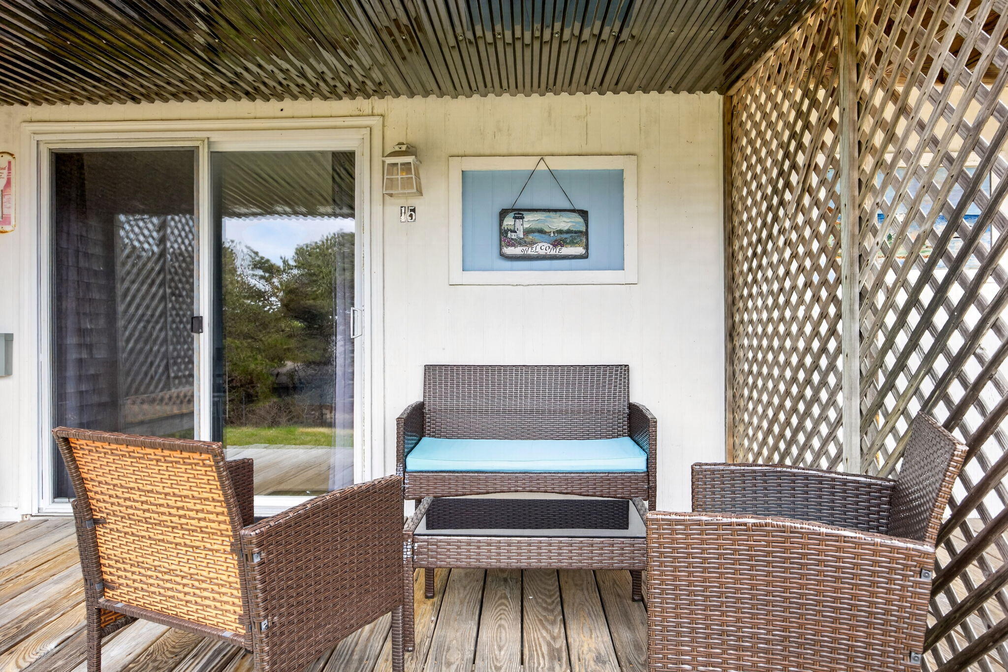 132 Shore Road, Unit 15 Truro, MA 02666 - Photo 18 of 33 a outdoor sitting area with a couch