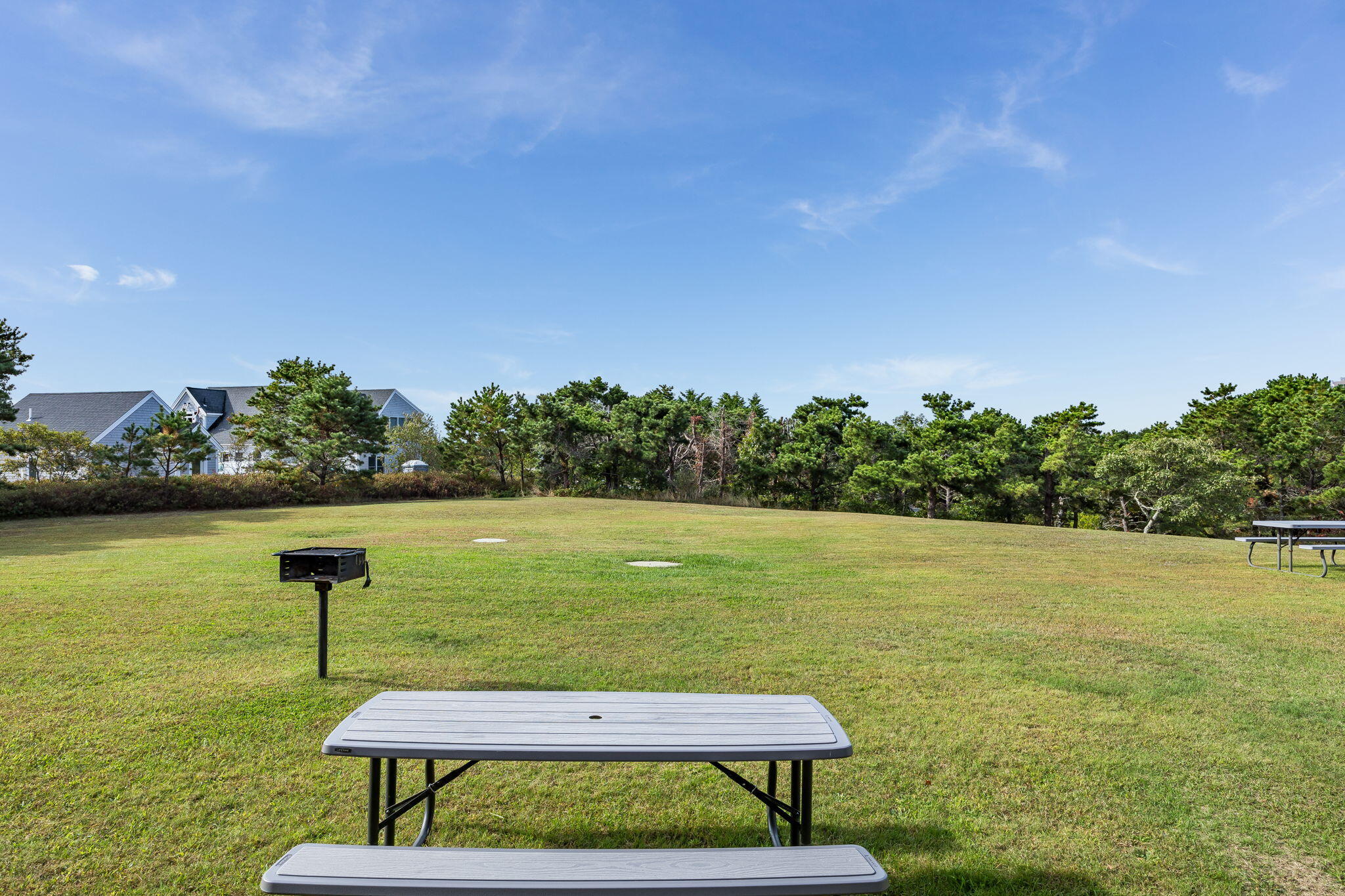 132 Shore Road, Unit 15 Truro, MA 02666 - Photo 25 of 33 a view of a lake with a yard