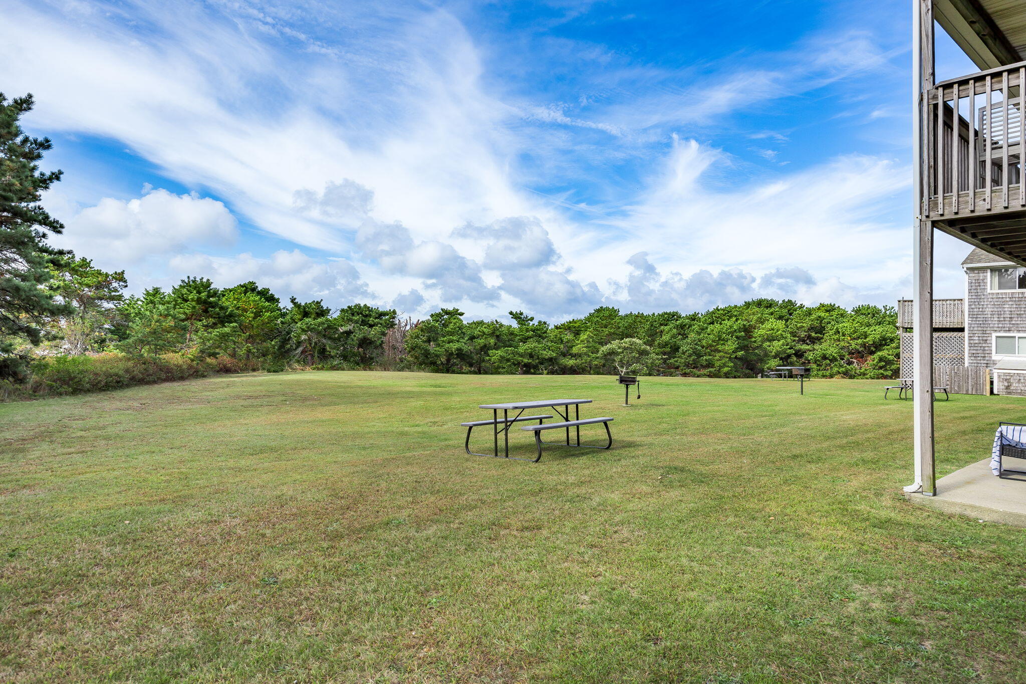 132 Shore Road, Unit 15 Truro, MA 02666 - Photo 26 of 33 a view of a lake with a big yard