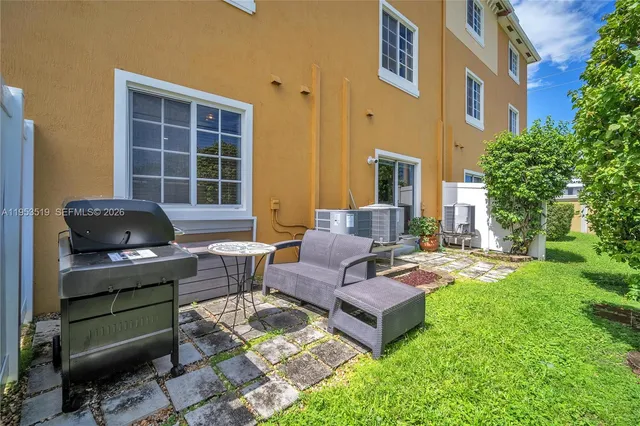 a building outdoor space with patio furniture