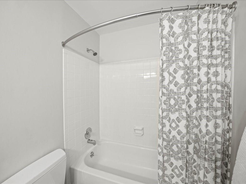50 Mt Vernon Circle Atlanta, GA 30338 - Photo 25 of 28 a bathroom with a shower curtain and a shower curtain
