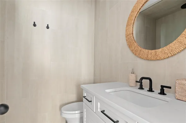 a bathroom with a sink and a toilet