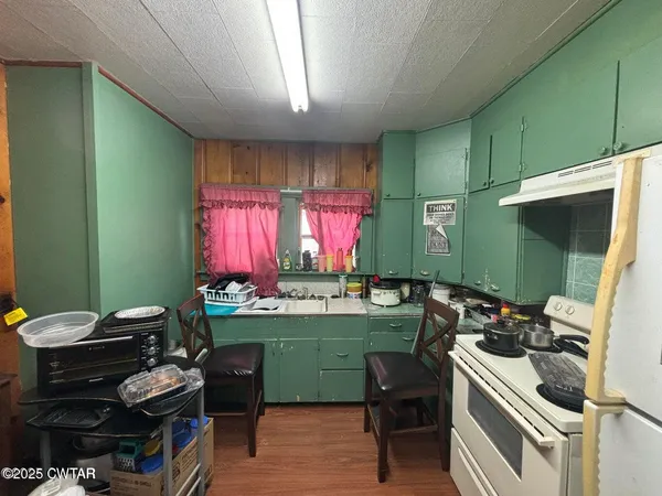 a room with furniture and a window