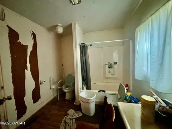 a bathroom with a sink and toilet
