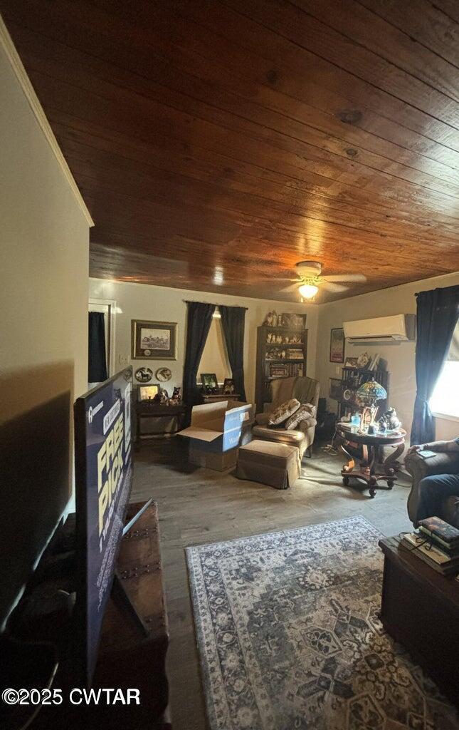 52 South Pleasant Street Decaturville, TN 38329 - Photo 27 of 46 a living room with furniture and a flat screen tv