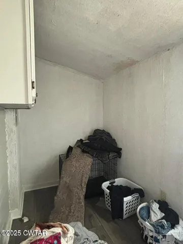 a room with furniture and a chair