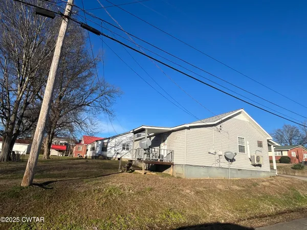 a view of a house with a garage