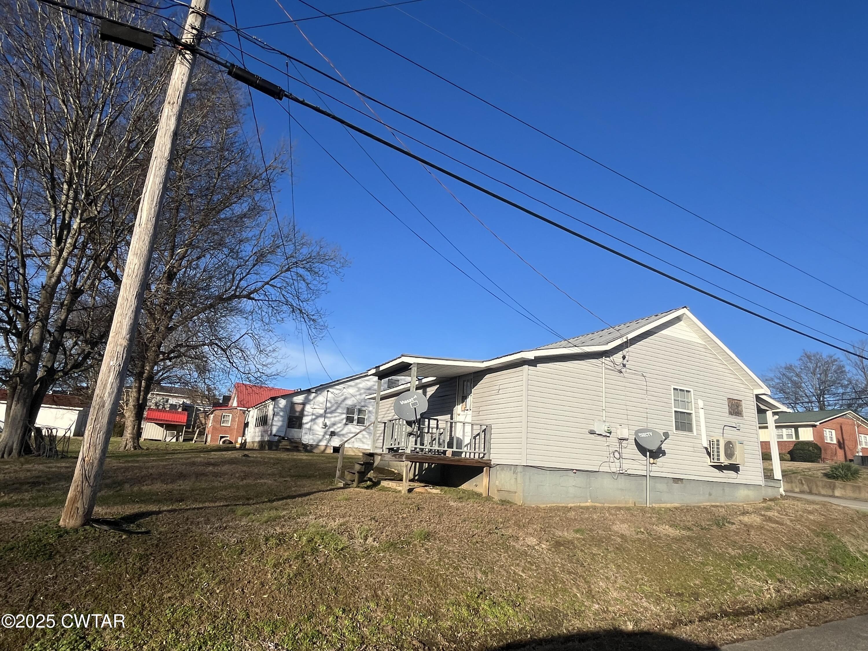 52 South Pleasant Street Decaturville, TN 38329 - Photo 38 of 46 a view of a house with a garage