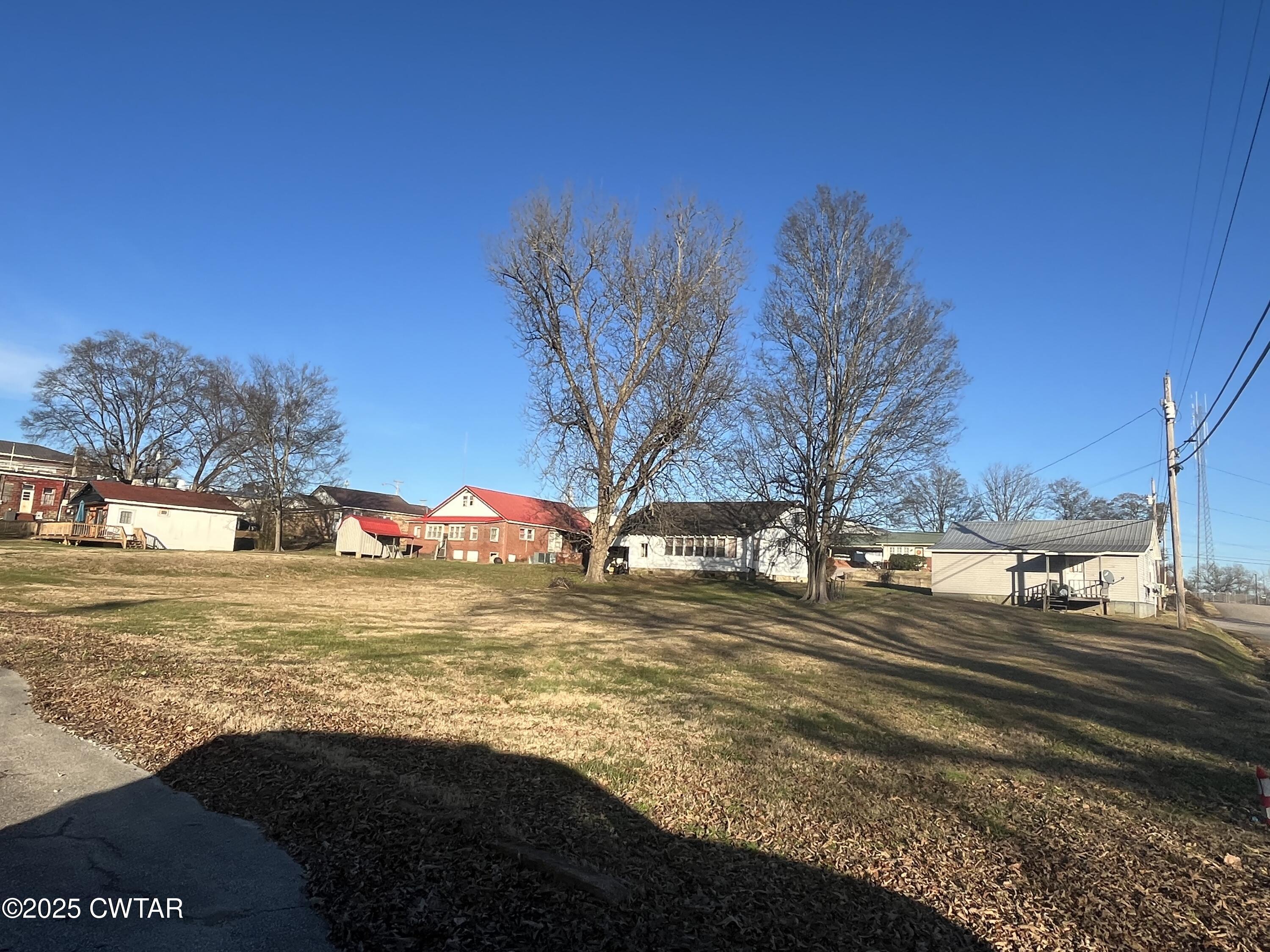 52 South Pleasant Street Decaturville, TN 38329 - Photo 41 of 46 a view of a yard with a house