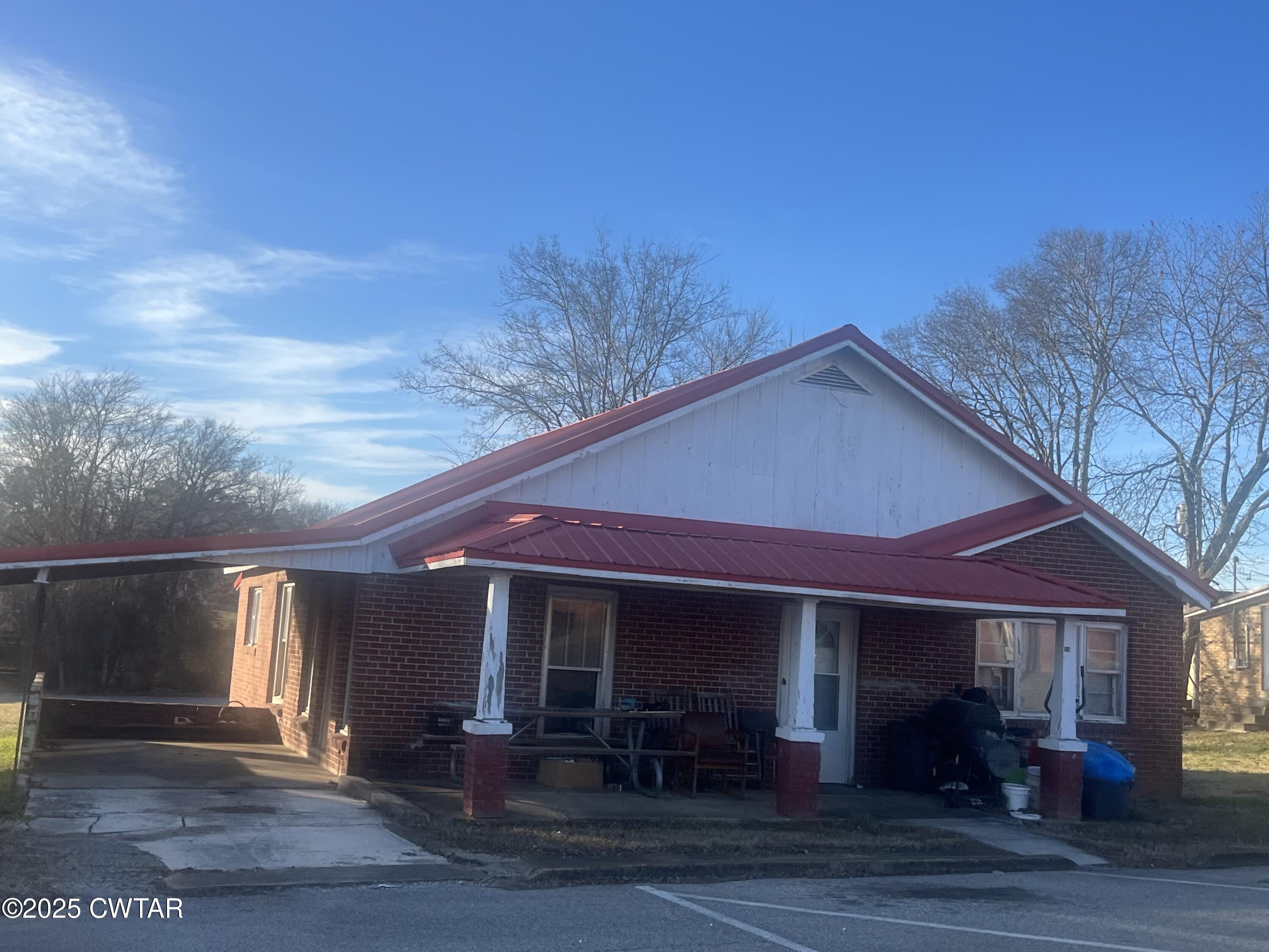 52 South Pleasant Street Decaturville, TN 38329 - Photo 42 of 46 a view of a house with a patio