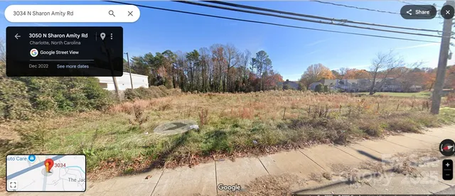 a view of a park with a sign board