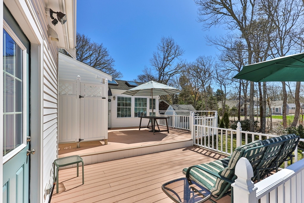 275 Lower County Road Harwich Port, MA 02646 - Photo 24 of 32 a view of a chairs and table in the balcony