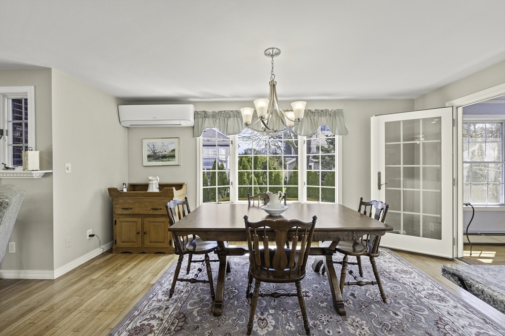 275 Lower County Road Harwich Port, MA 02646 - Photo 5 of 32 a view of a dining room with furniture window and outside view