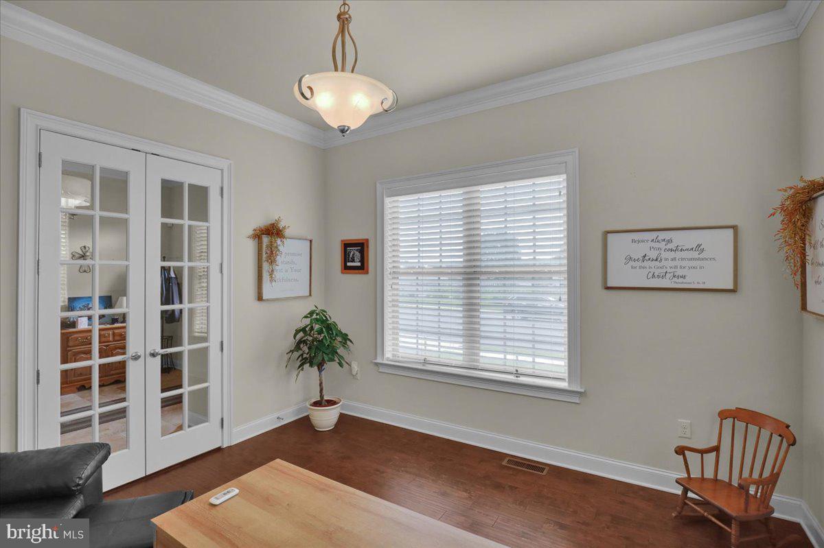 661 Integrity Drive Lititz, PA 17543 - Photo 15 of 37 a view of an empty room with a window and wooden floor